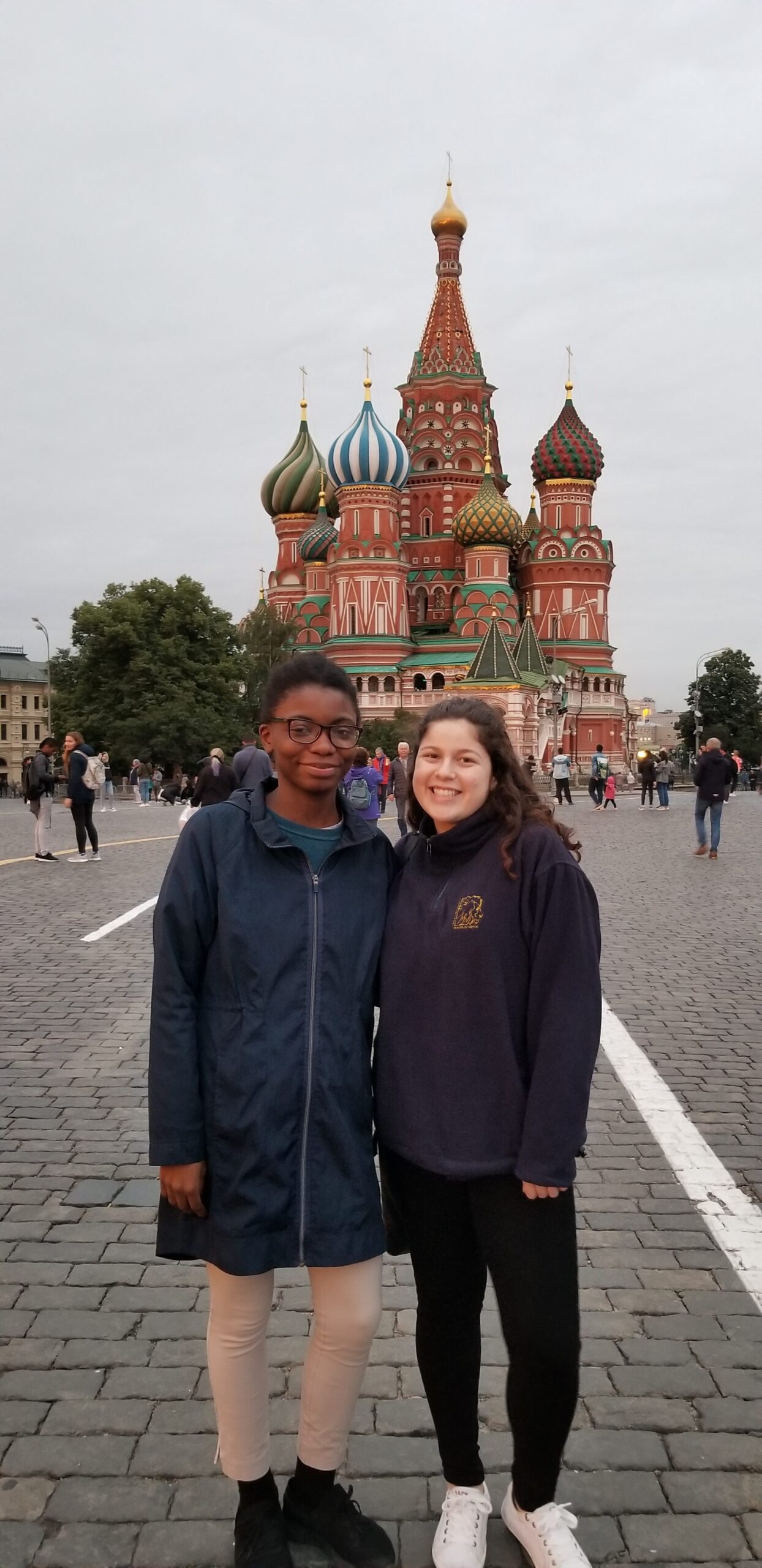 Maryam standing in front of Saint Basil's Cathedral in Moscow