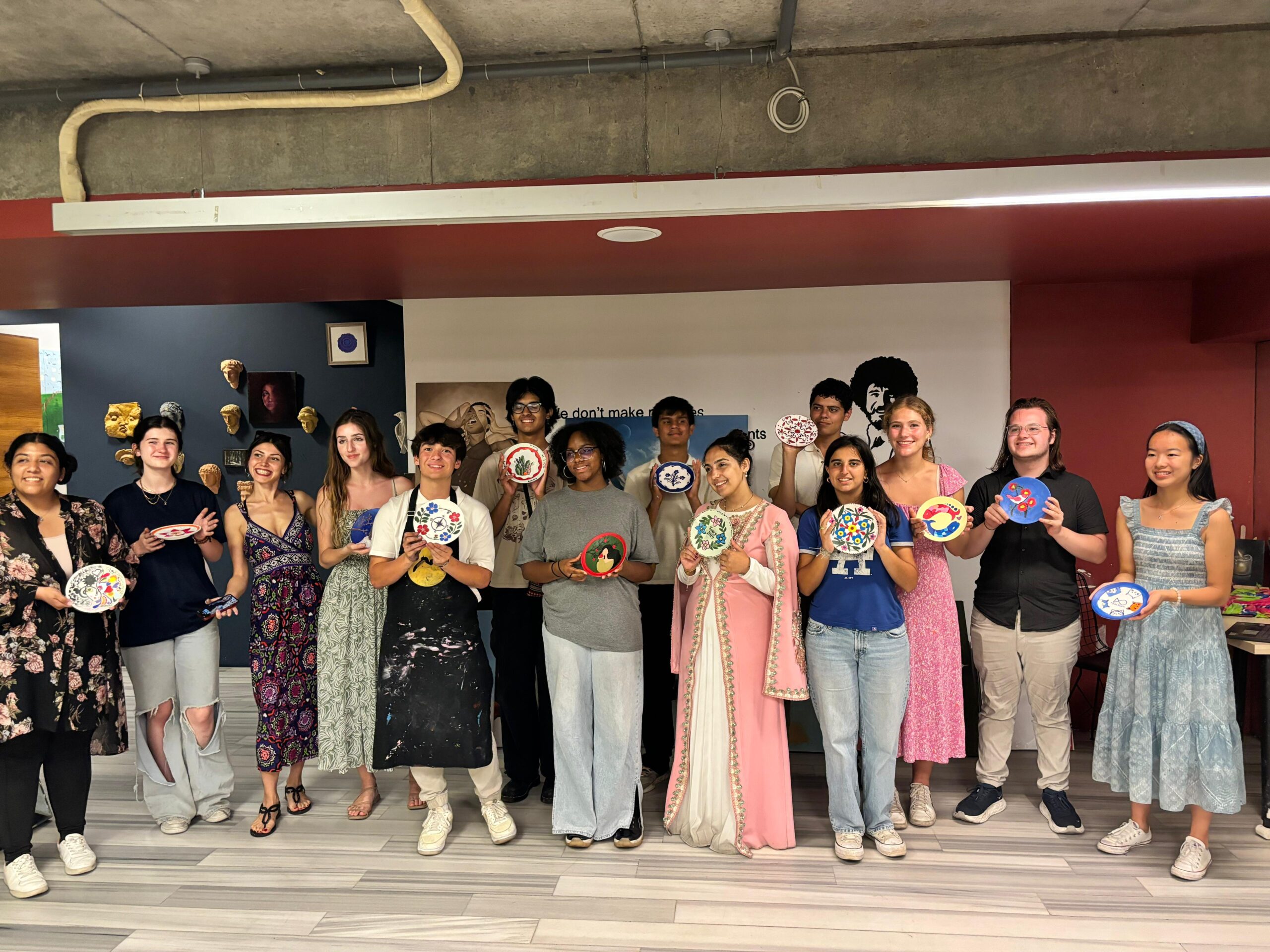 Turkish students display their art work after a cultural activity.