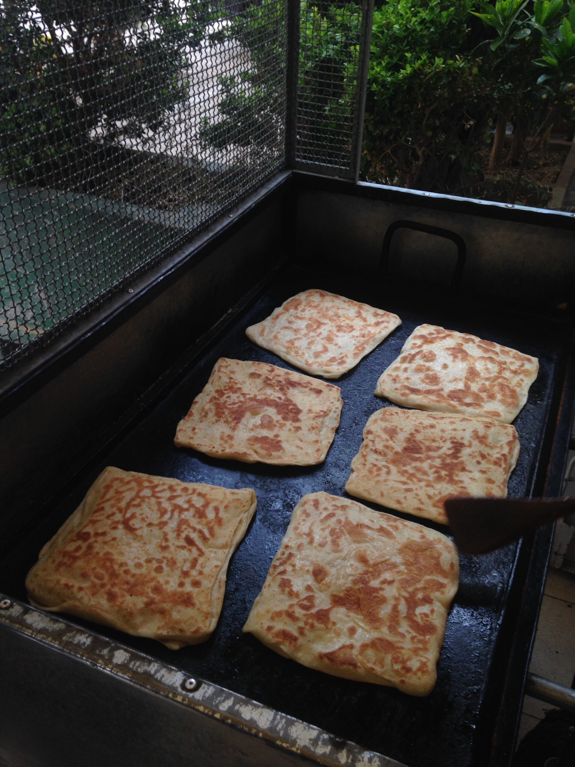Breads bake in an open air oven