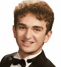Headshot of a student in a tuxedo