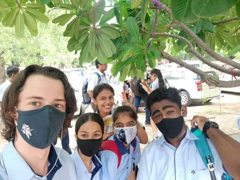 Liam with other students in India