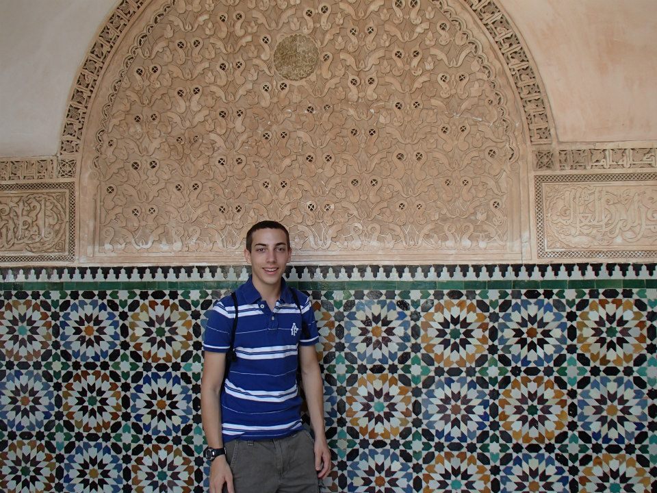 Jake in front of Moroccan tile