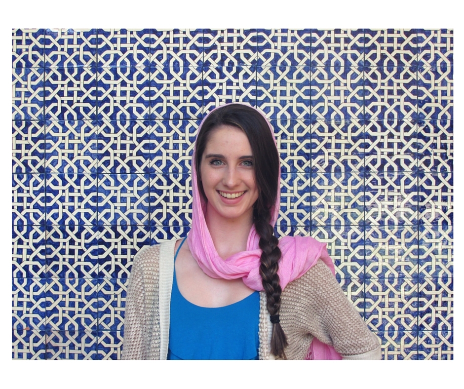 Image of Nilaya in front of Moroccan tile