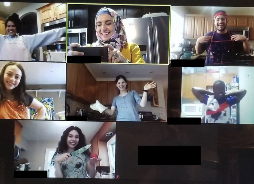 Tania cooking with her classmates
