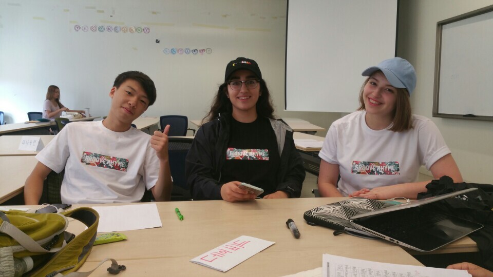 image of three nsli-y students studying at a table together