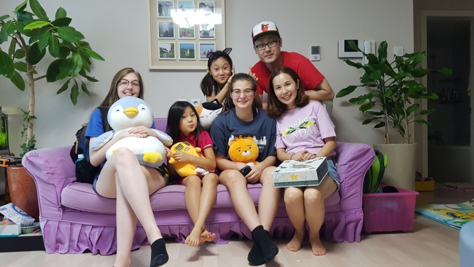 Ashley poses with her host family in Korea