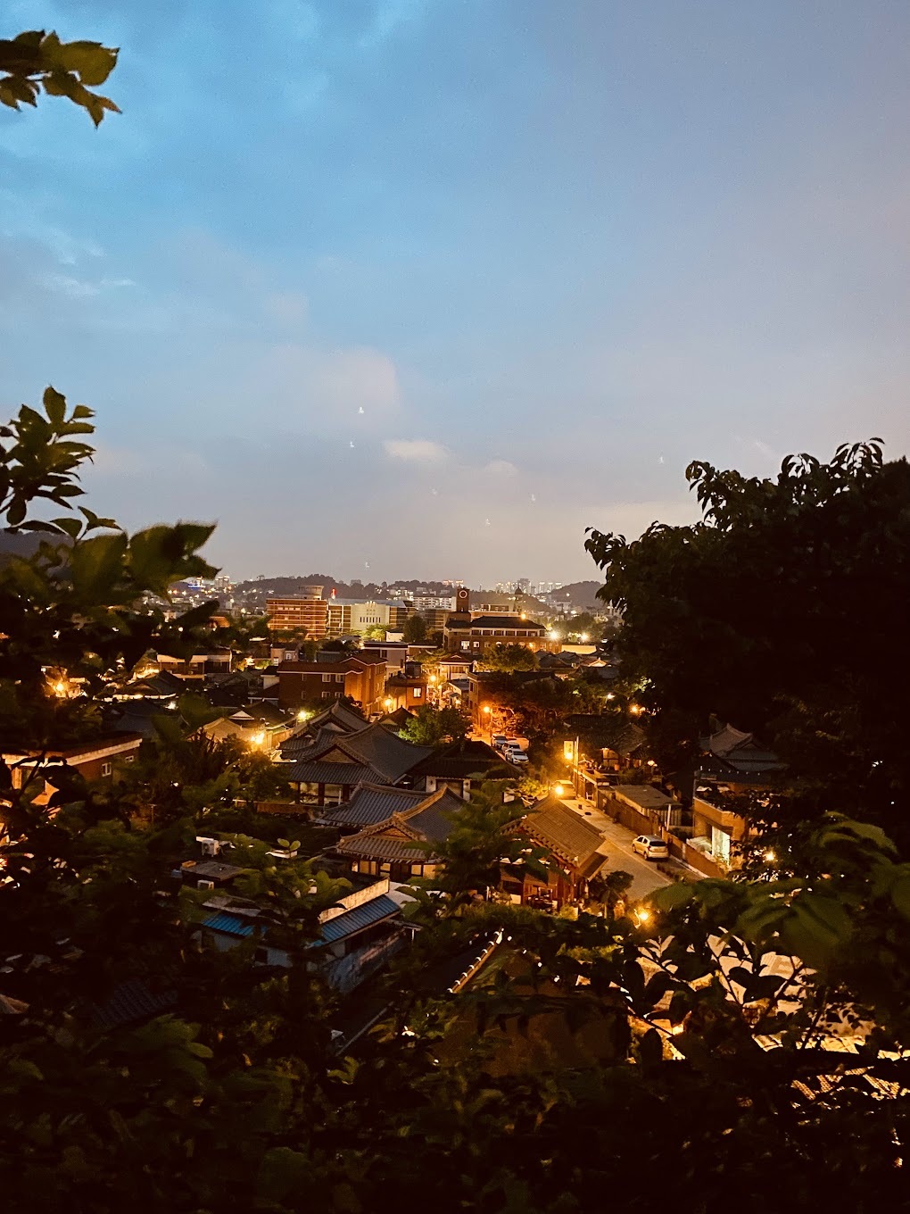 Over looking a Hanok village at night.