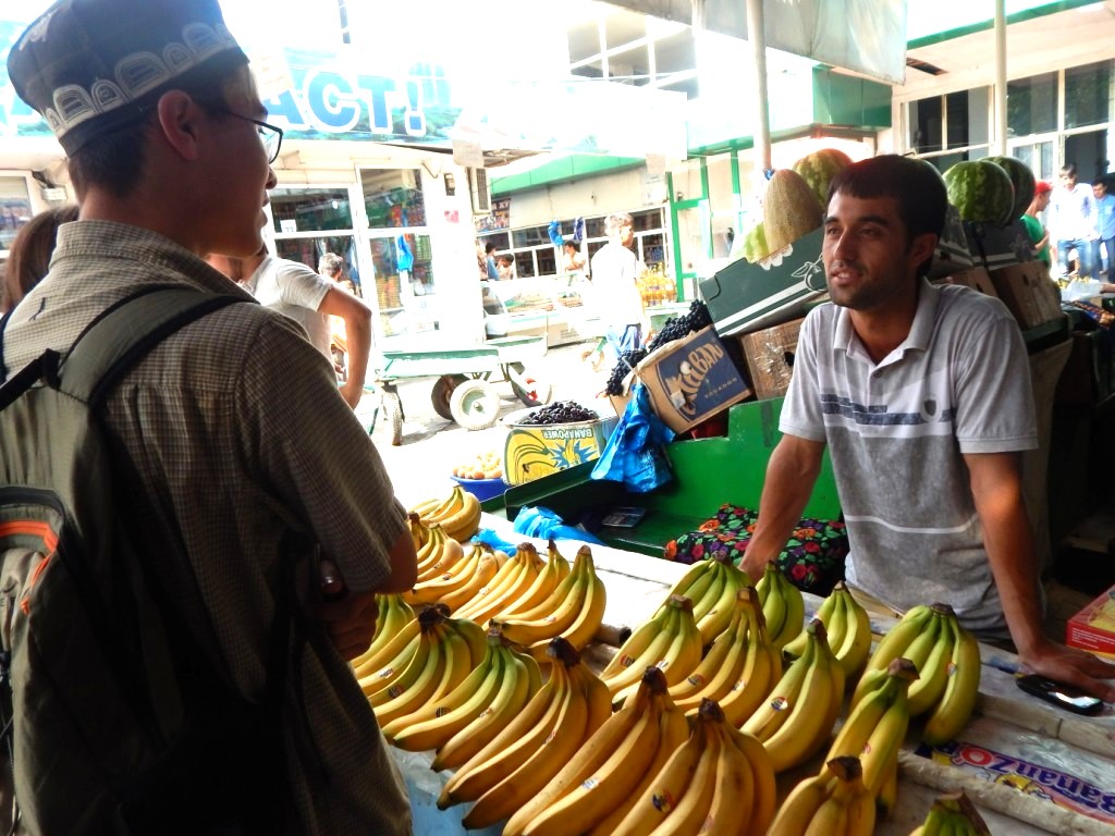 NSLI-Y student practicing his language skills in a Tajik bazaar